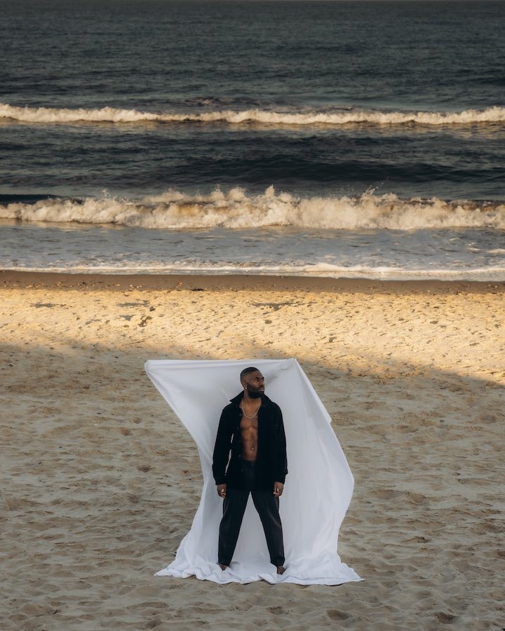Black Paddy portrait at Brittas Bay — open beach, Atlantic light, Wicklow